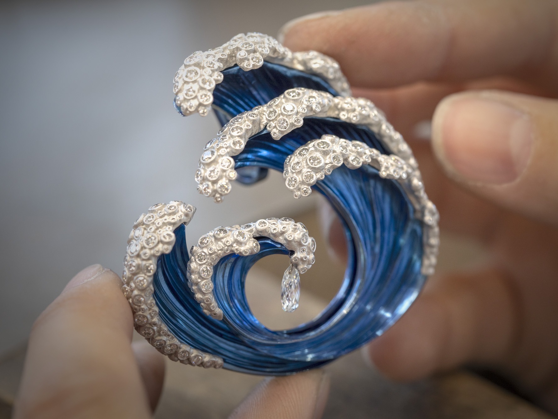 Chopard titanium wave engravings