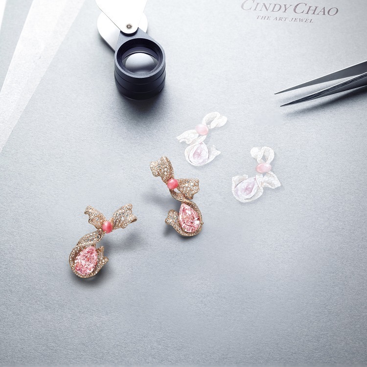 Fancy Intense Pink Diamond Ribbon Earrings studio lighting