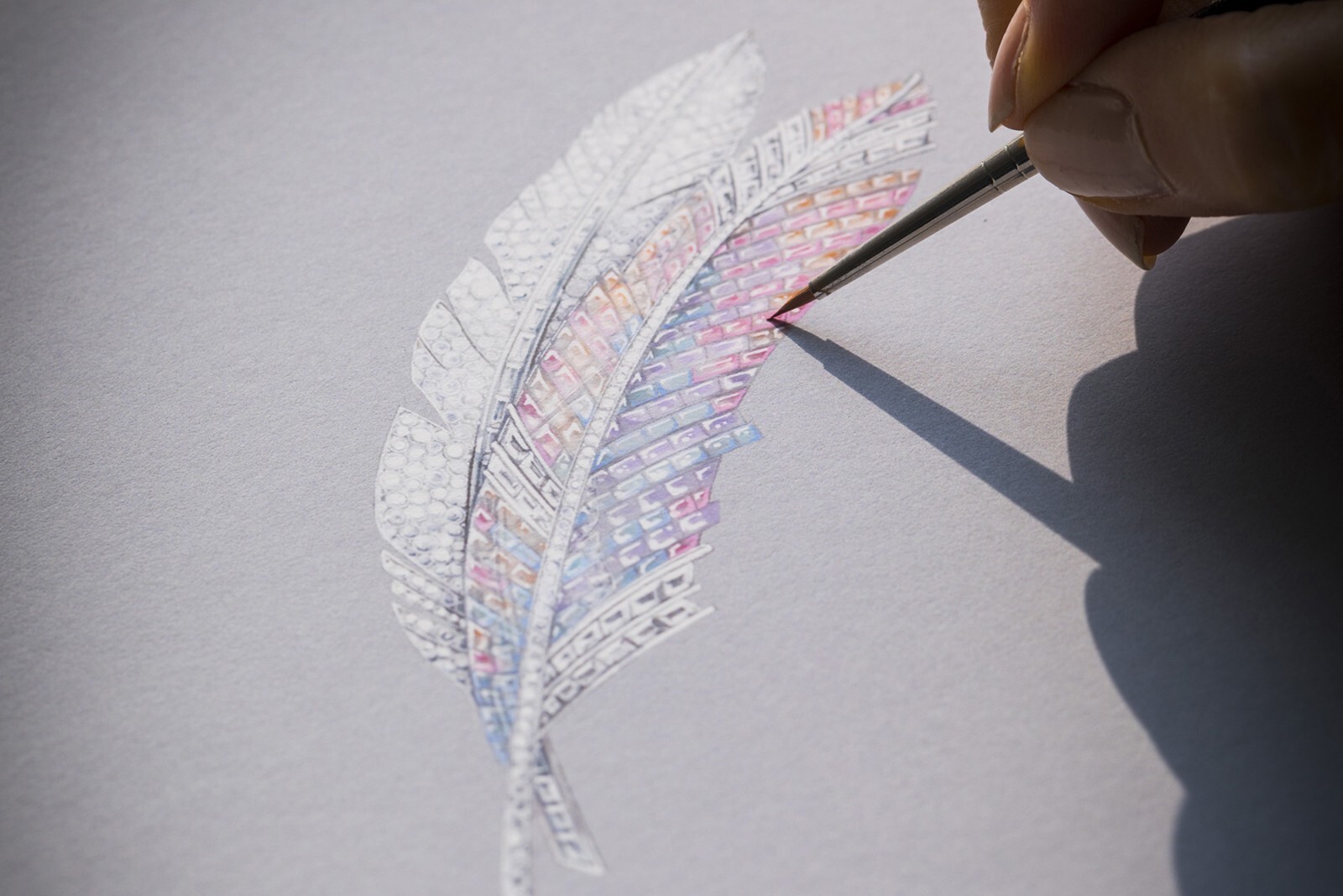 Full view of the Van Cleef & Arpels Panache Mystérieux white gold feather brooch