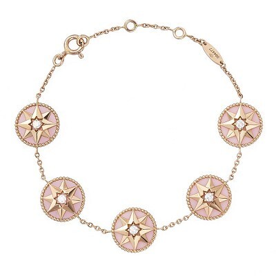 Dior Rose des Vents bracelet featuring pink opal on one side and a rose gold compass rose on the reverse