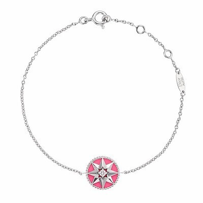 Vibrant fluorescent Dior Rose des Vents bracelets in pink, green, and orange ceramic colors