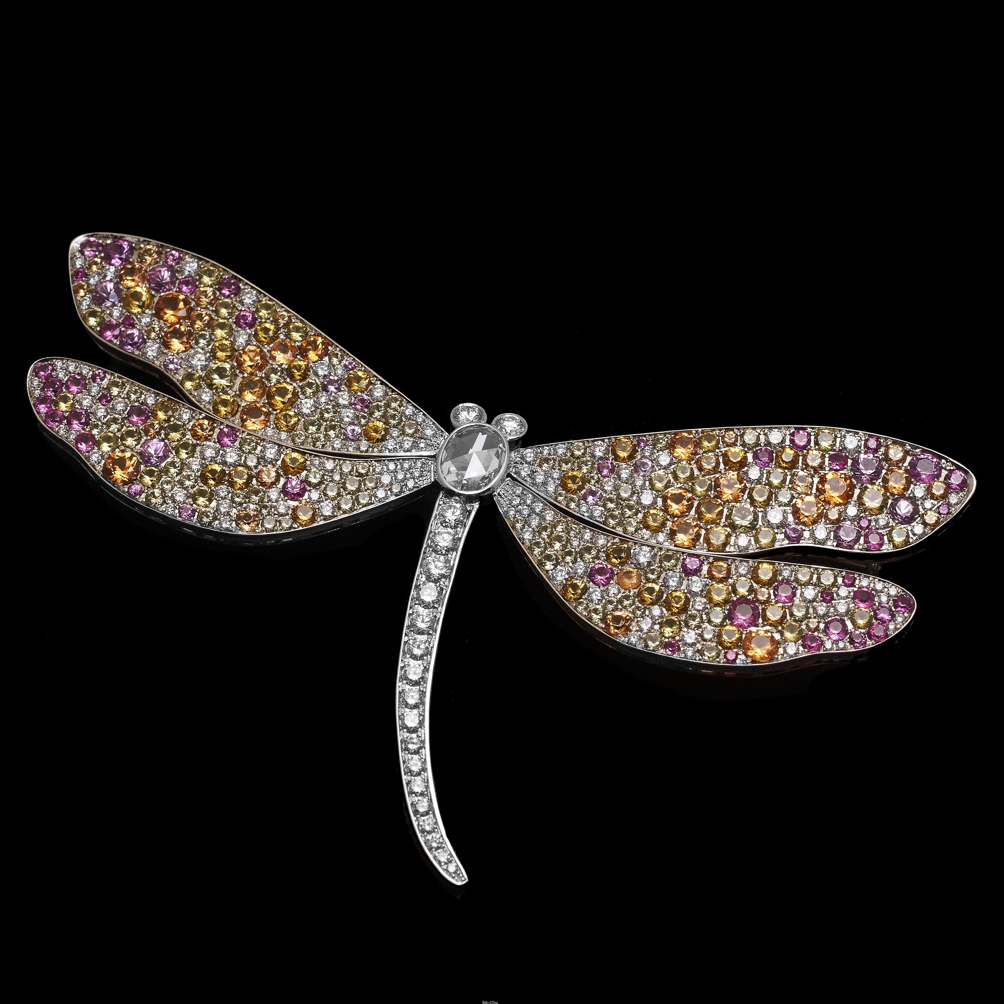 Angled view of the Tiffany & Co. Dragonfly Brooch highlighting the iridescent gemstone colors.