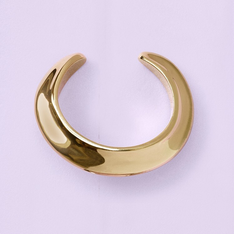 An artistic arrangement of Céline Precious and Baroque jewelry pieces highlighting their contrasting styles.