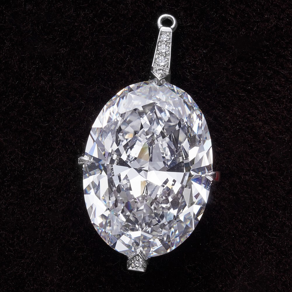 The exceptional 20.04 carat oval-cut diamond pendant of the Cartier Adiante necklace