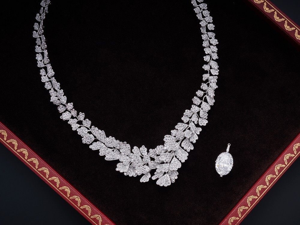The Cartier Adiante diamond necklace showcasing its adaptability with the detachable pendant