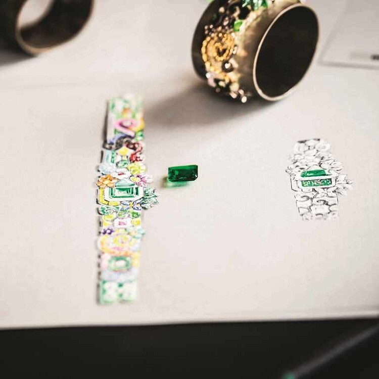 The elegant bracelet of the Dior Parterre du Midi Émeraude Secret Watch adorned with colorful gemstones