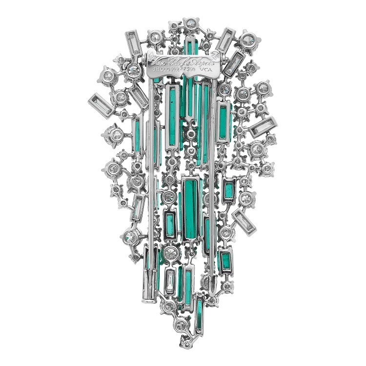 Detailed close-up of the Van Cleef & Arpels Sneffel brooch with raw emerald crystals
