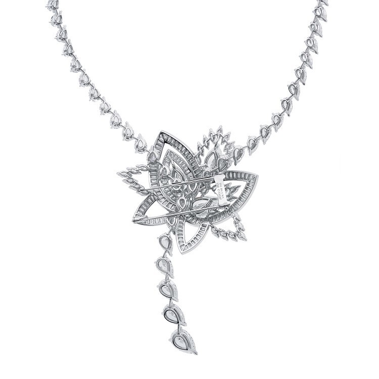 Side profile of the De Beers Blooming Lotus necklace, emphasizing its three-dimensional structure and flowing lines