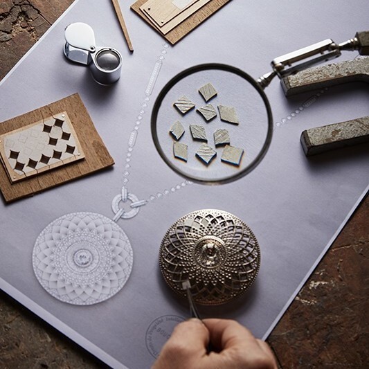 Intricate craftsmanship and material blend in the Boucheron Rostov pendant, highlighting its luxury appeal