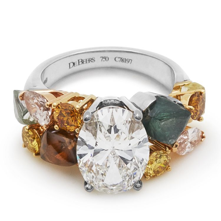 Angled view of the De Beers Soothing Lotus ring, highlighting the unique rough diamonds and meticulous setting.