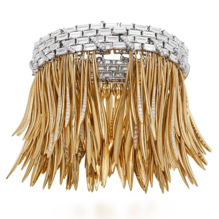 Detailed shot of the handcrafted gold fern leaves on the Tiffany & Co. Whispers of the Rain Forest Bracelet
