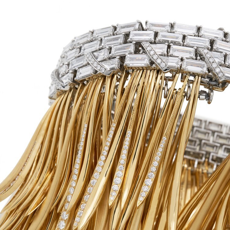 Tiffany & Co. Whispers of the Rain Forest Bracelet worn on a wrist, demonstrating the dynamic movement of the leaves