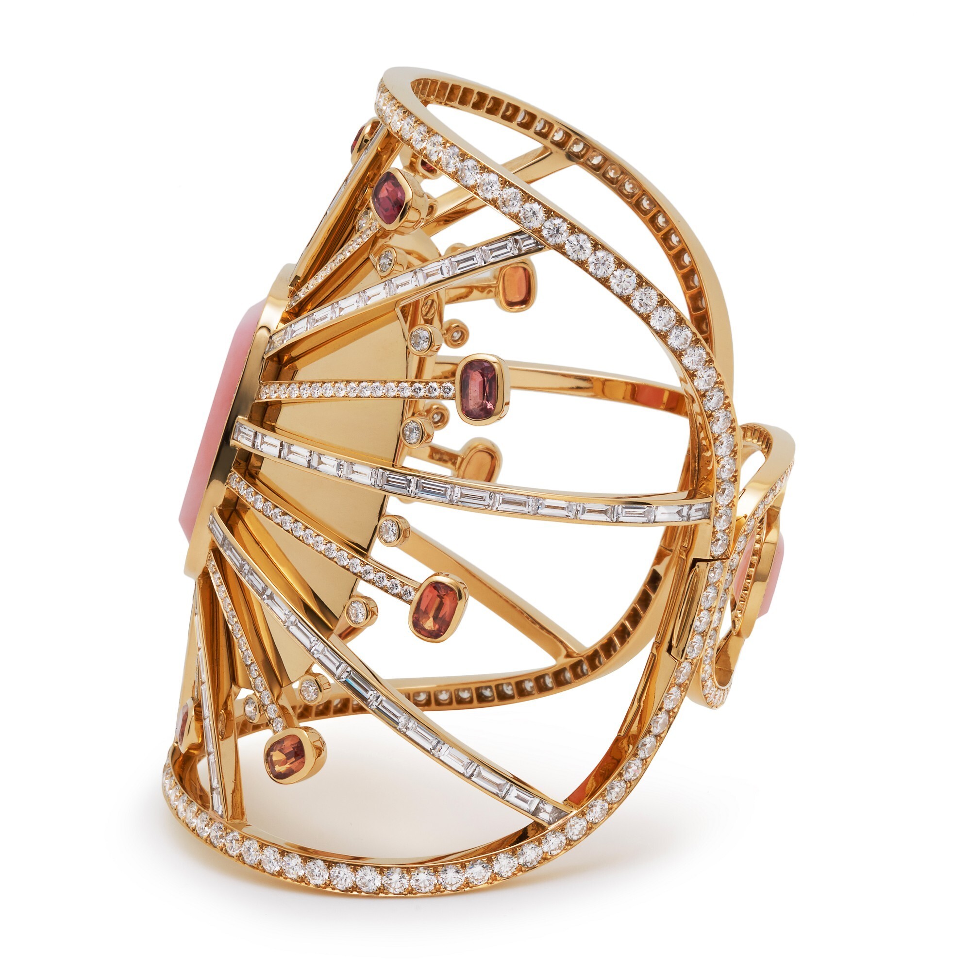 Angled view of the Hermès Attelage Céleste gold ring, showcasing its intricate design and precious gemstone setting.