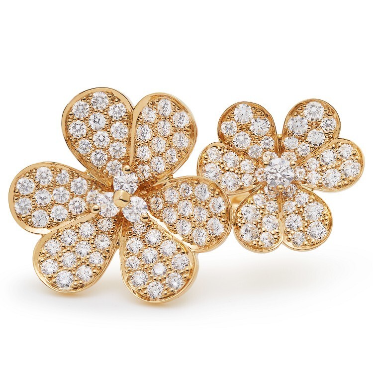 Close-up of a Van Cleef & Arpels Frivole finger ring adorned with brilliant-cut diamonds