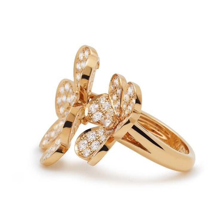 Detailed view of the Van Cleef & Arpels Frivole ring's intricate floral diamond setting