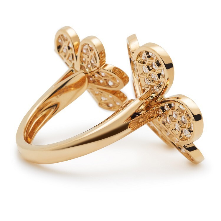 Elegant Van Cleef & Arpels Frivole ring with two asymmetrical diamond flowers