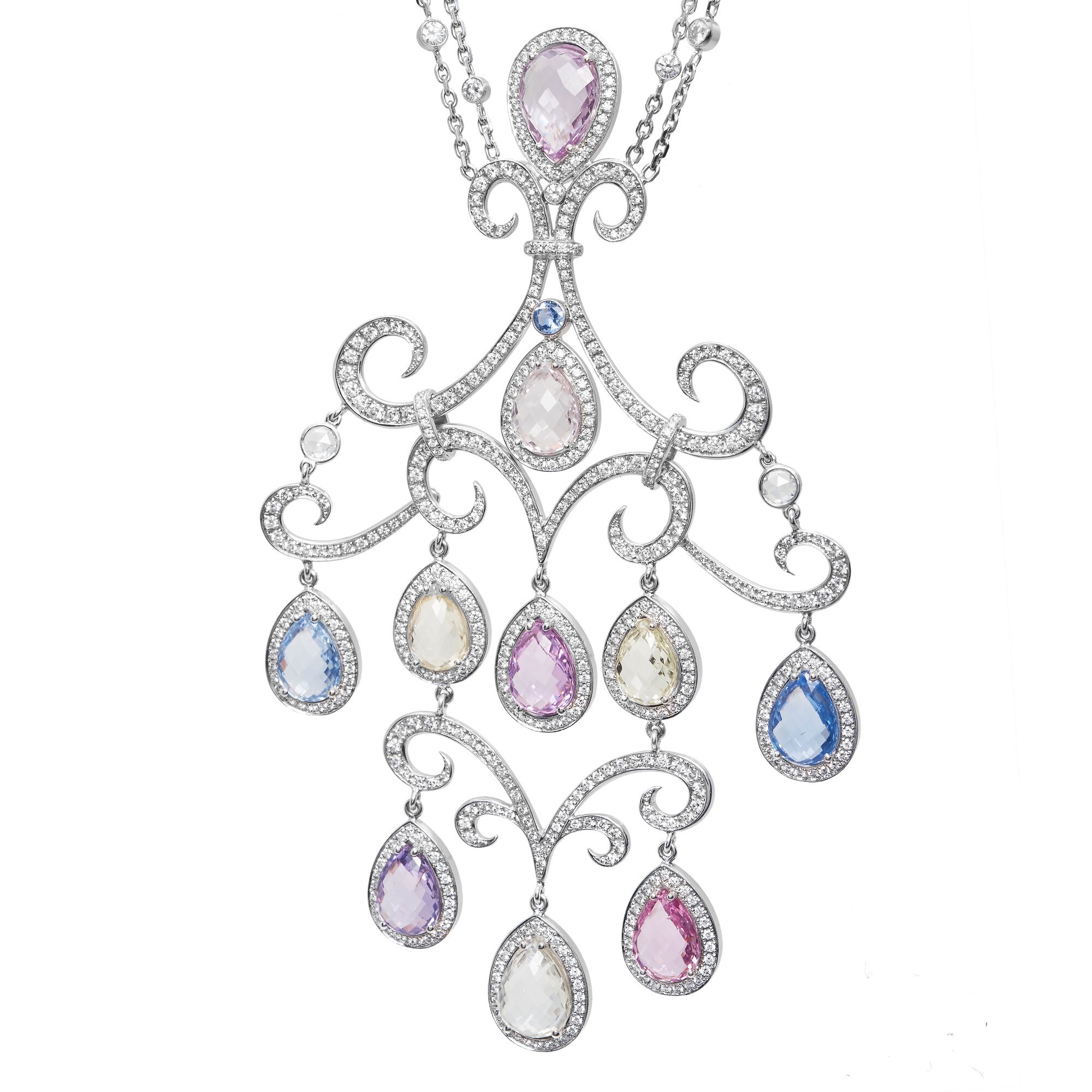 Detailed shot of the Chopard Copacabana pendant's briolette-cut pastel sapphires and diamond-studded vine structure.