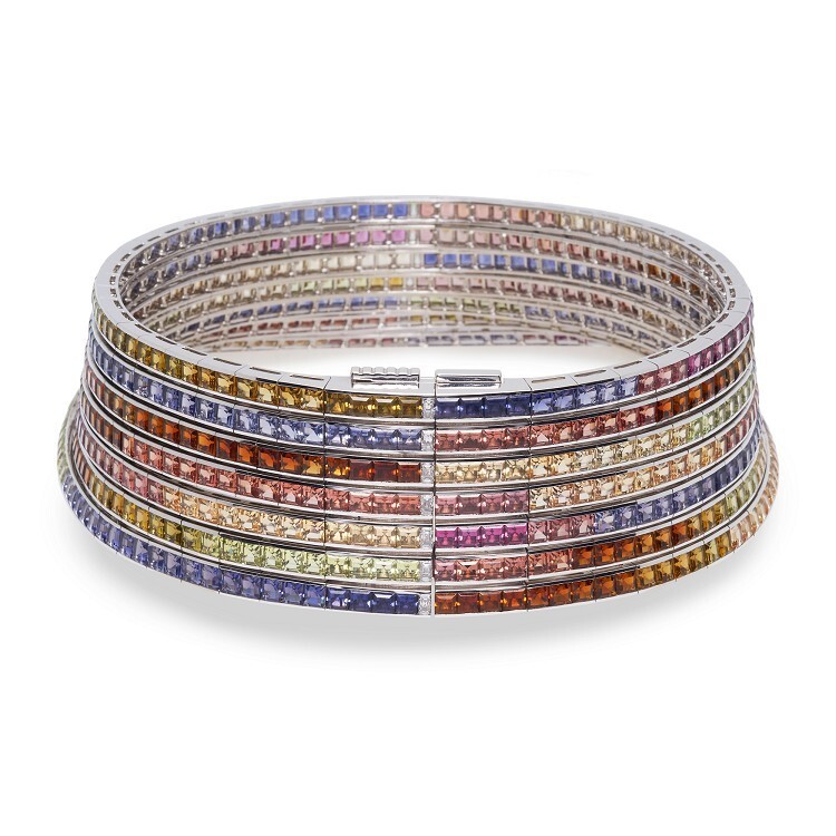 Side profile of the Hermès Feux du Ciel collar, revealing its naturally curved arc and layered design.