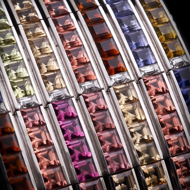 Artistic composition of the Hermès Feux du Ciel necklace, highlighting the harmonious blend of colors and shapes.