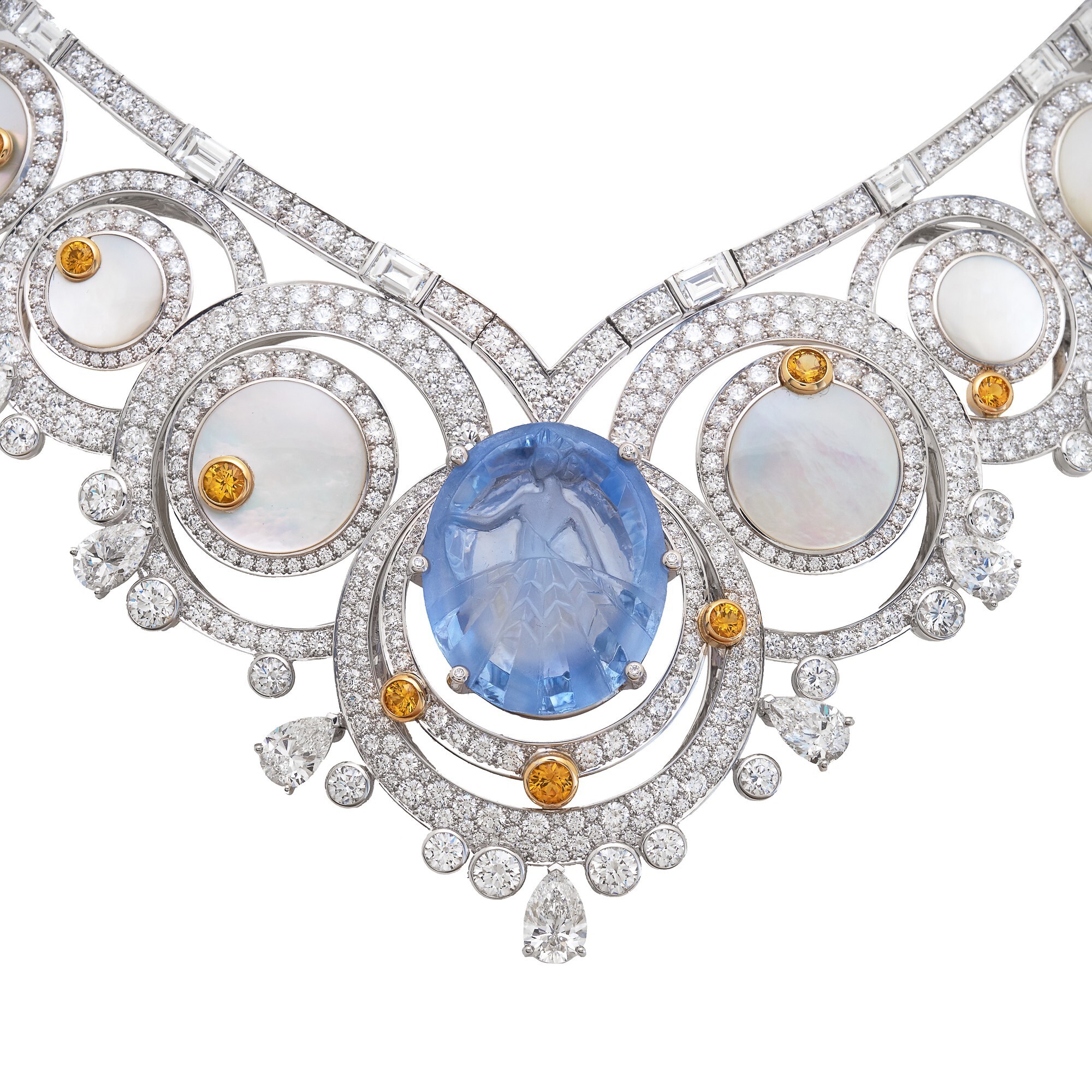 Detailed view of the Van Cleef & Arpels Ballet Précieux necklace, highlighting the engraved ballerina on the oval sapphire.