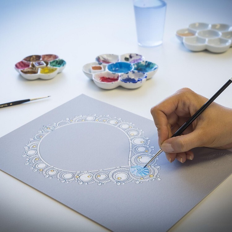 Side angle of the Van Cleef & Arpels Ballet Précieux necklace, showing the intricate design and gemstone arrangement.