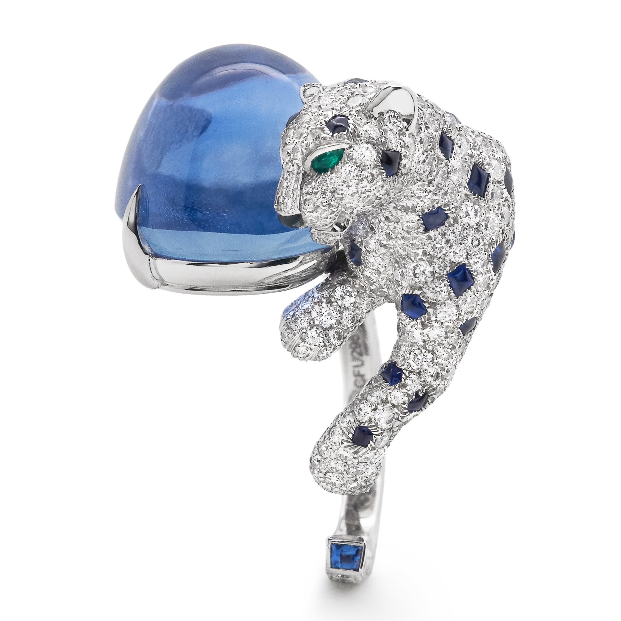 Top-down view of the Cartier Panthère De Cartier sapphire ring, emphasizing the brilliant-cut diamonds and cabochon sapphires forming the leopard's spots.