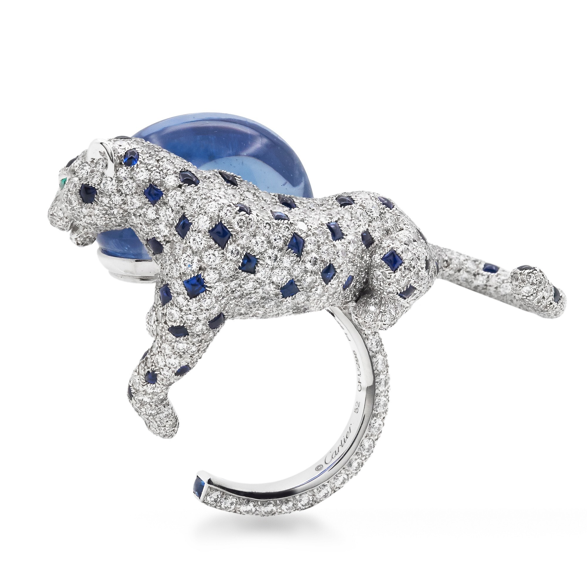 Detailed shot of the Cartier Panthère De Cartier ring, focusing on the emerald eyes and onyx nose of the sculpted panthère.