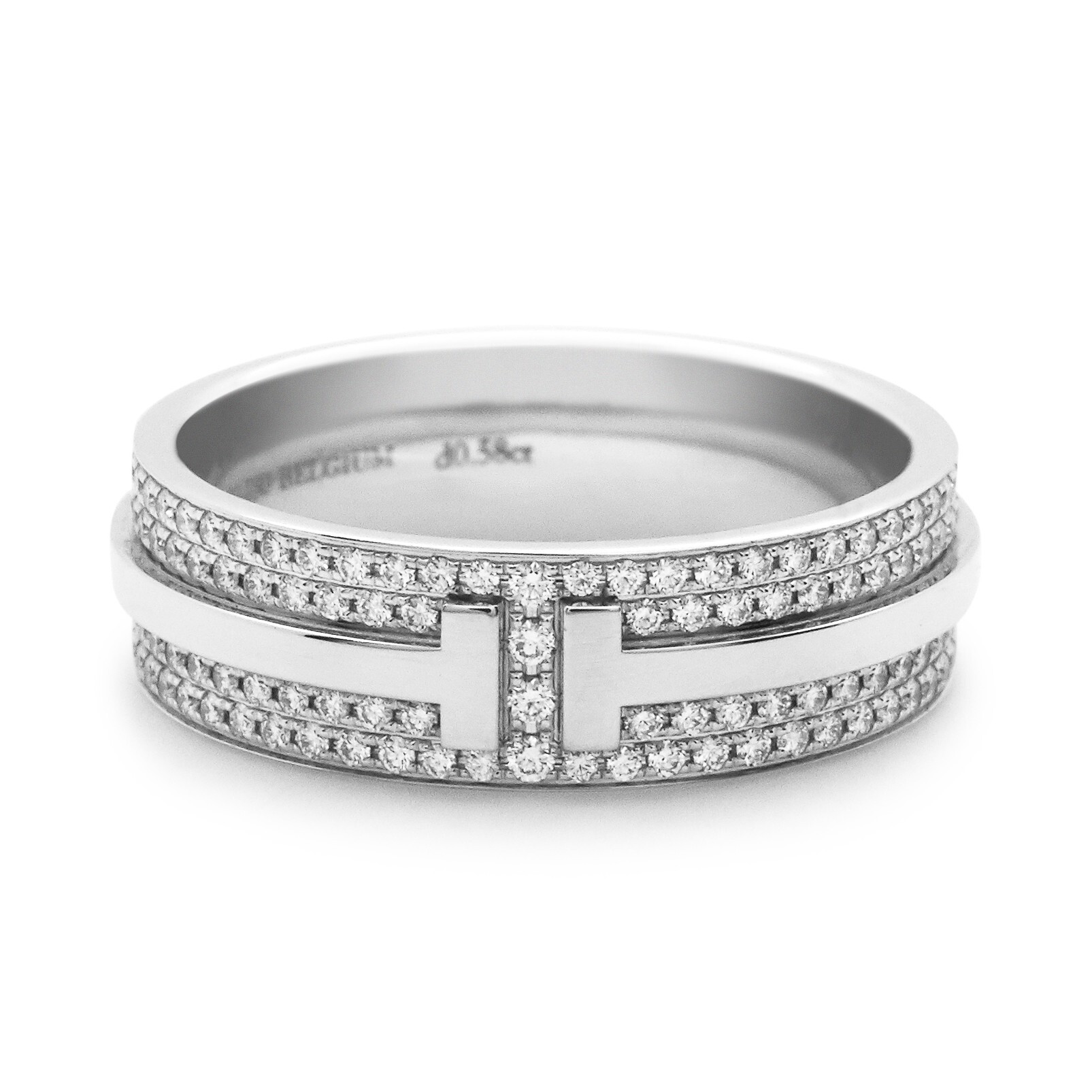 Close-up view of the Tiffany T Two platinum ring with round brilliant pavé diamonds.