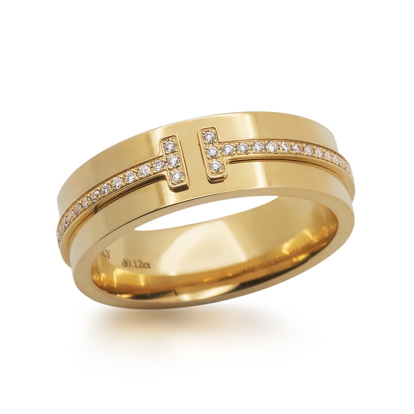 The Tiffany T Two ring crafted in lustrous 18k gold, showcasing its refined silhouette.