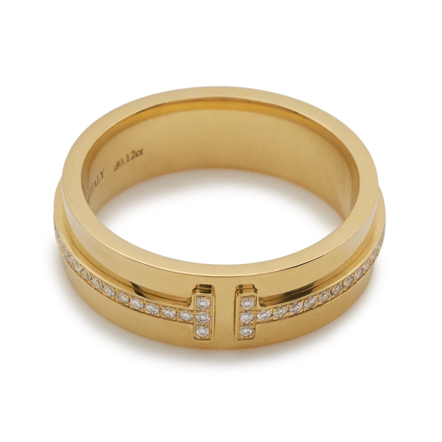 A side profile view of the Tiffany T Two 18k gold ring, emphasizing the sculpted 'T' detailing.