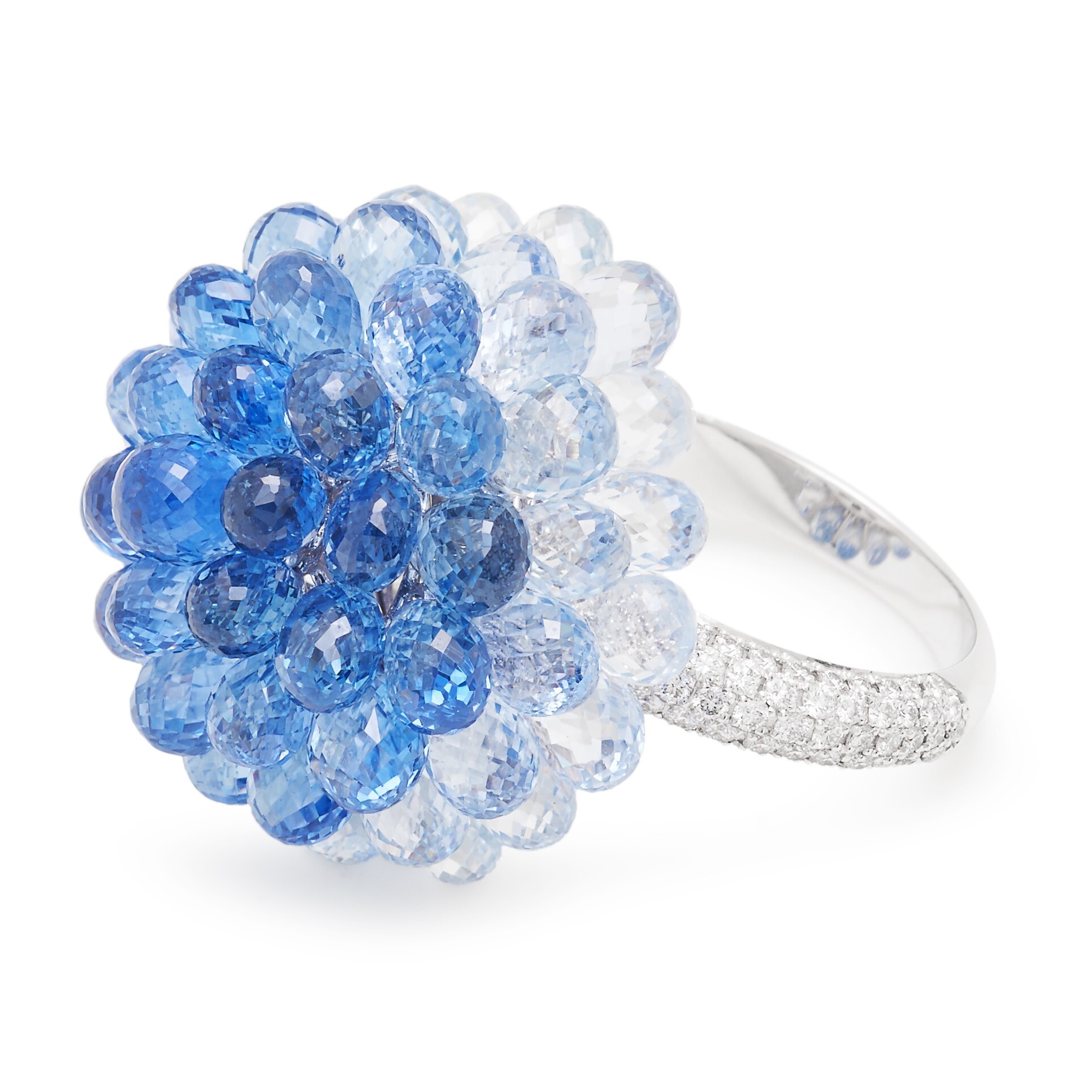 Close-up of a Chopard Copacabana ring, showcasing the vibrant array of pear-shaped gemstones