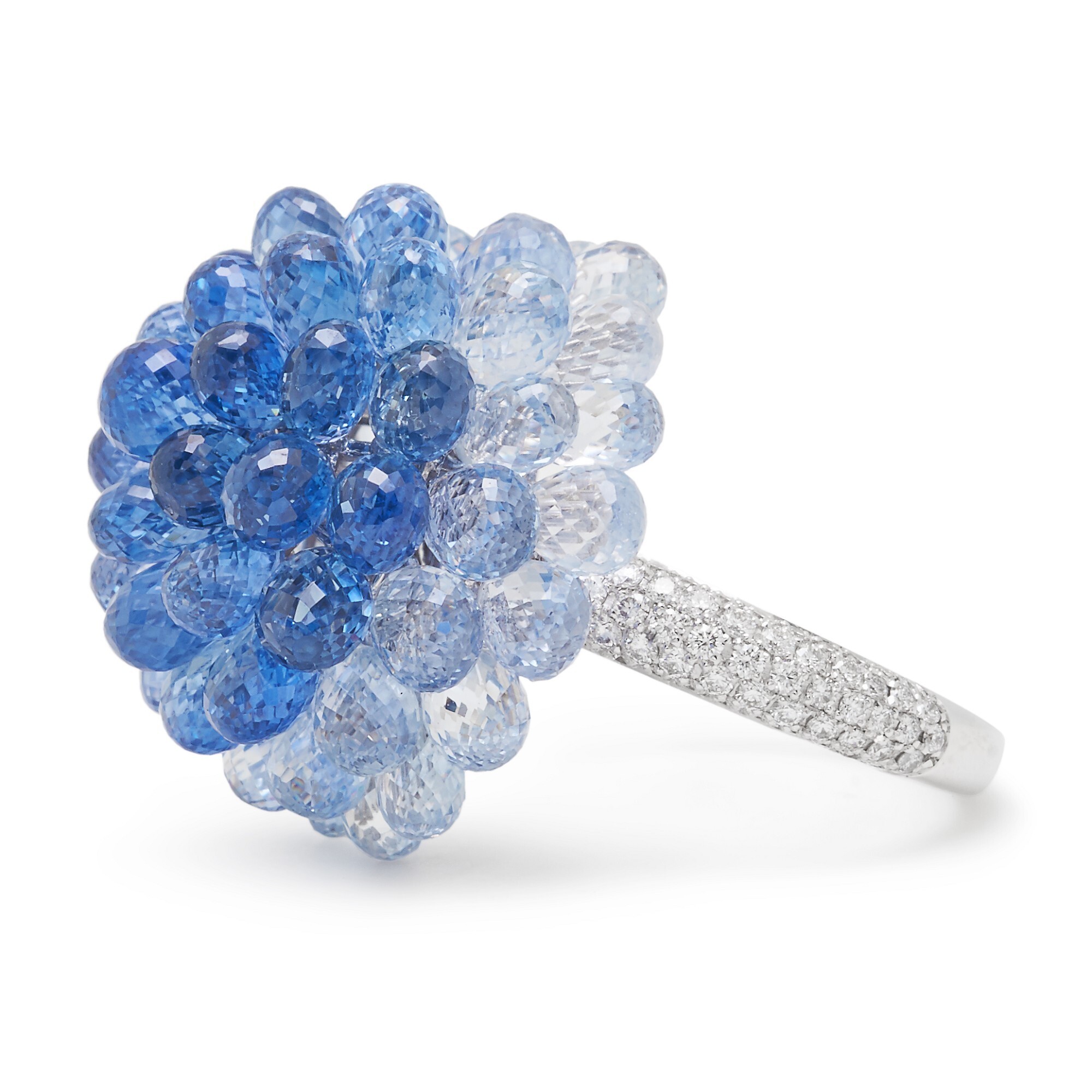 Top-down view of the Chopard Copacabana blue sapphire ring, highlighting its hemispherical design