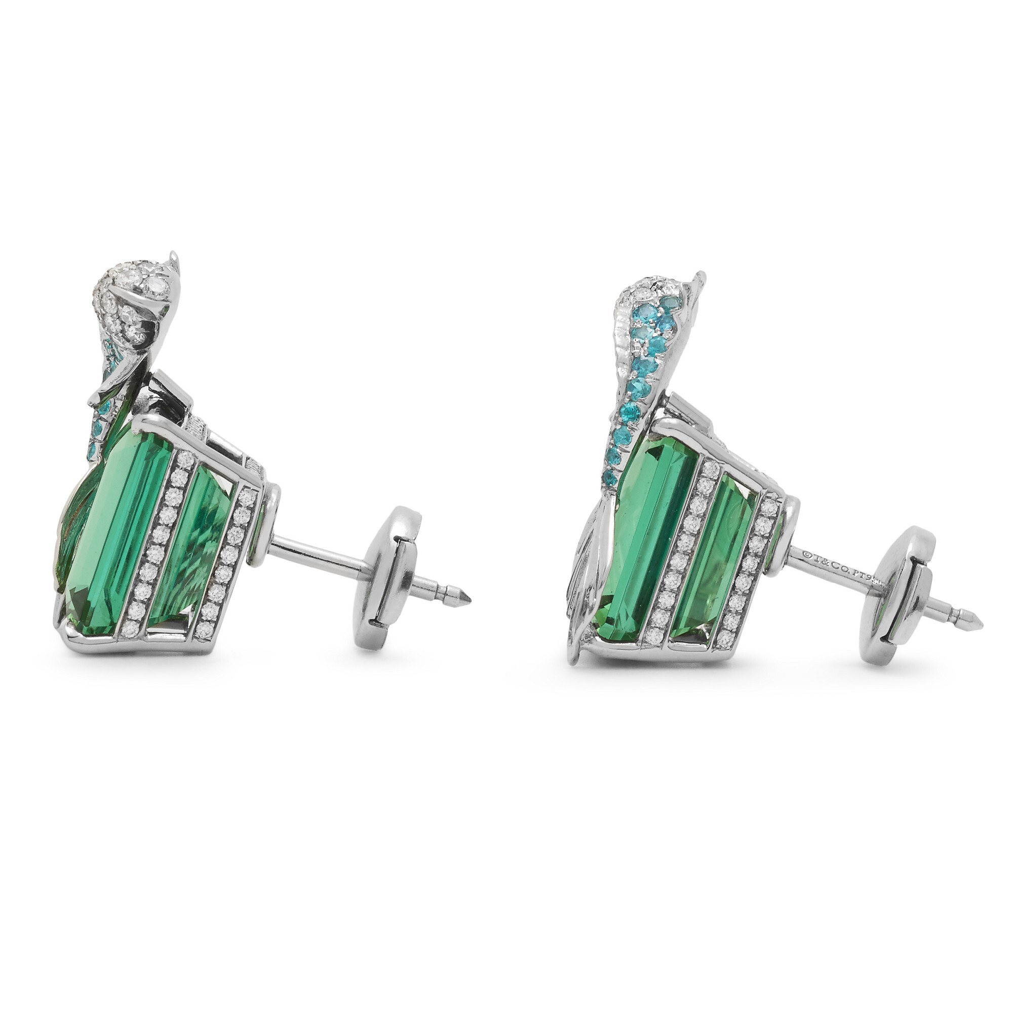 Close-up of Tiffany & Co. Blue Book goldfish earrings, showcasing intricate diamond and Paraiba tourmaline details on the platinum fish body.