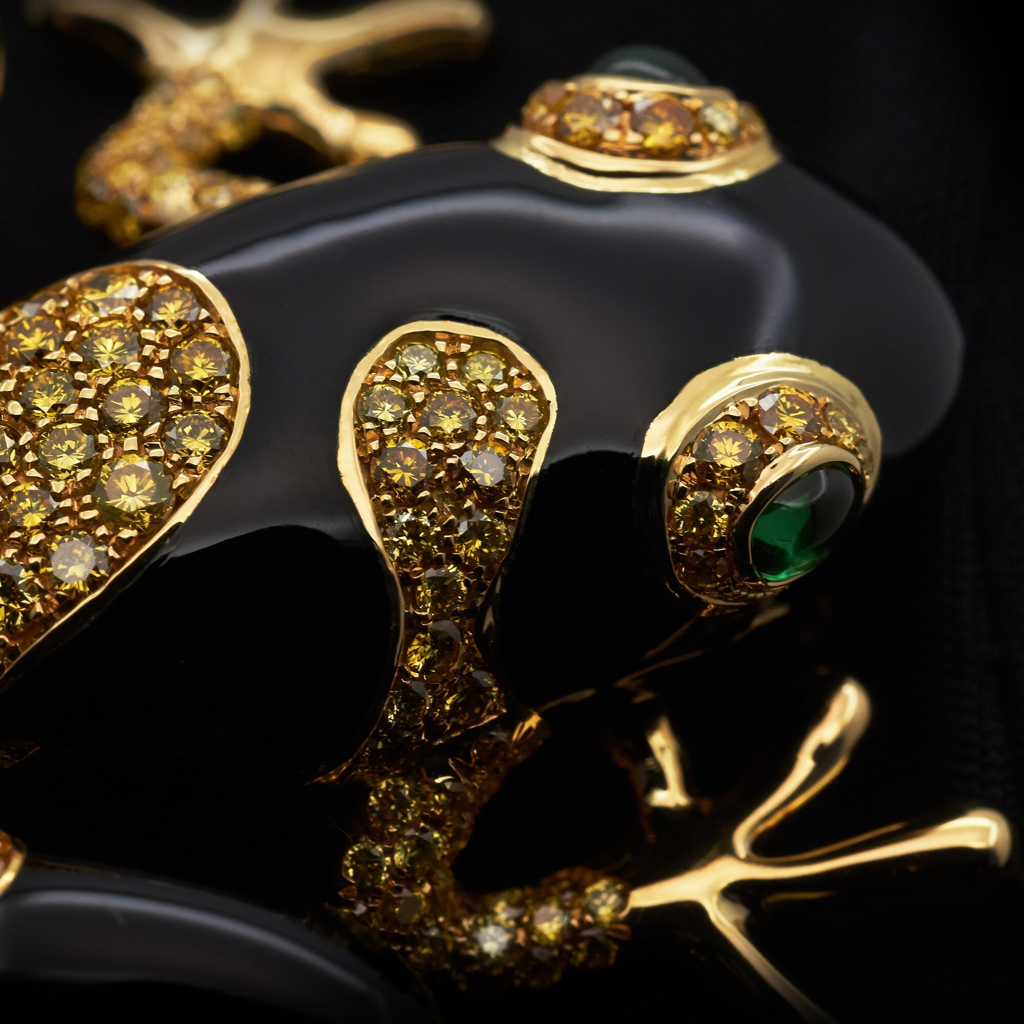 Back view of the Tiffany & Co. tree frog brooch, revealing the intricate gold structure, precise enamel finish, and overall craftsmanship.