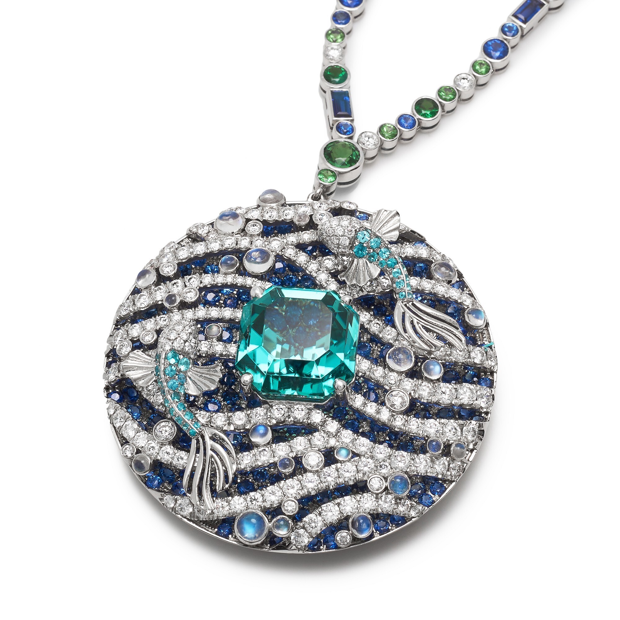 Detailed shot of the Tiffany & Co. pendant necklace, showcasing the vibrant blue-green octagonal Paraiba tourmaline and diamond-encrusted goldfish.