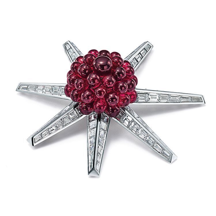 The luminous rubellite beads at the heart of the Tiffany & Co. Blue Book Starburst Brooch.