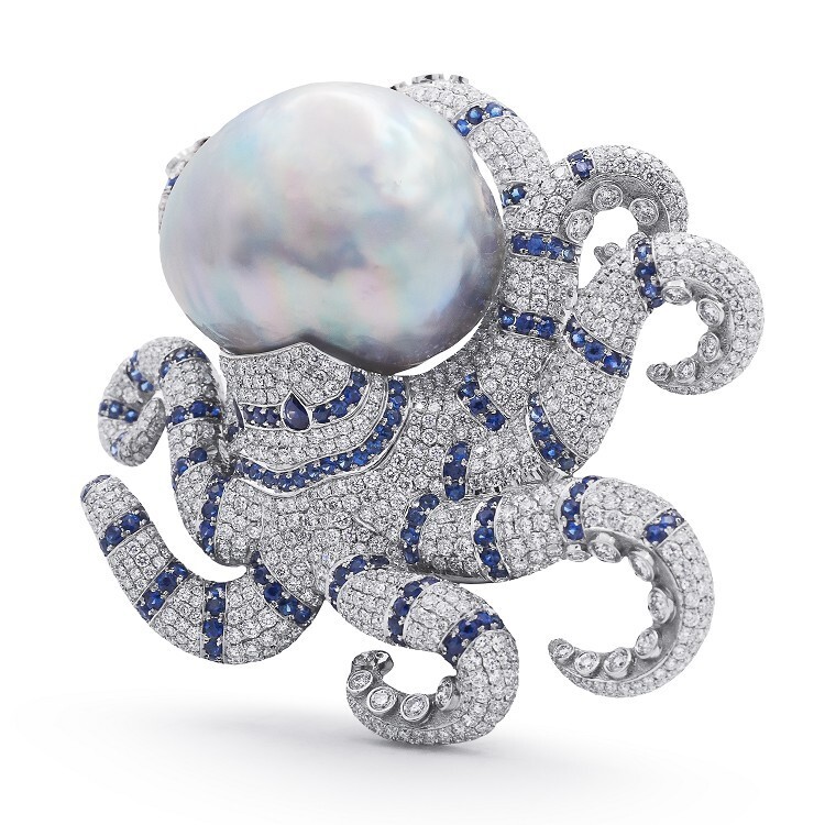 Detailed close-up of the Tiffany Octopus Brooch with sapphire accents and platinum setting