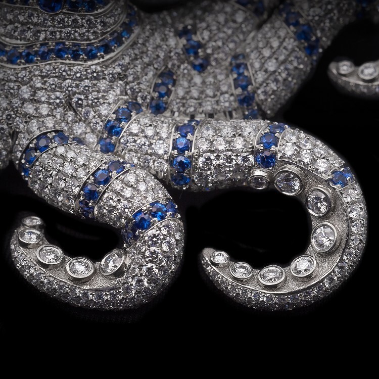 Exquisite detail of the Tiffany Octopus Brooch's diamond-paved tentacles and suction cup motifs