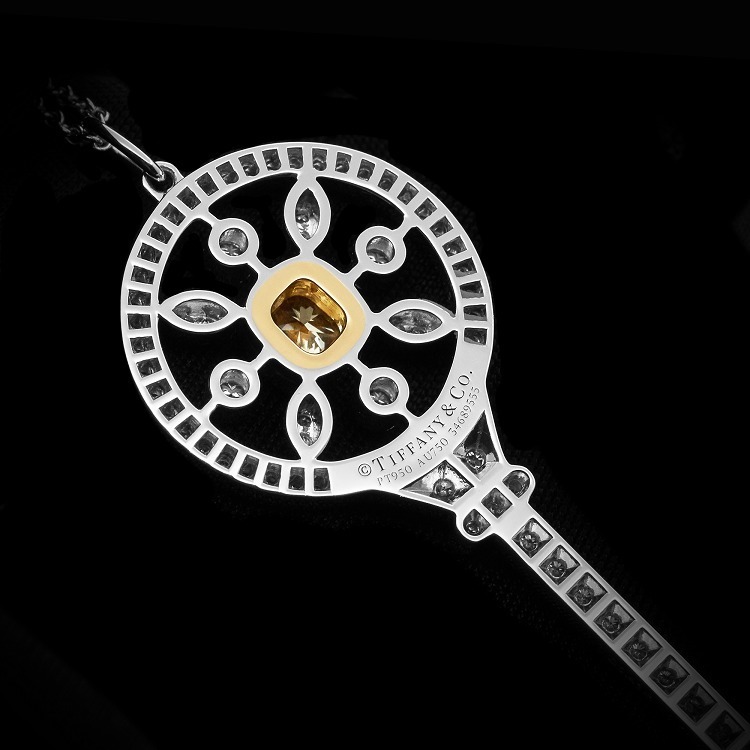 Side profile of the luxurious Tiffany & Co. Kaleidoscope Key Pendant, highlighting its platinum structure