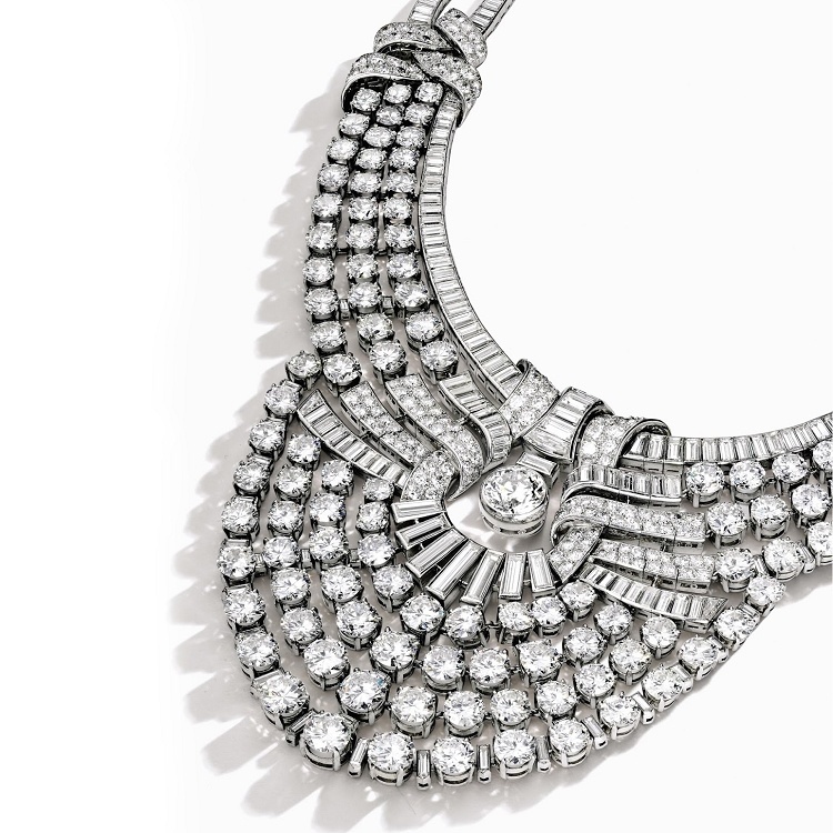 Detailed view of a Van Cleef & Arpels diamond necklace showcasing brilliant and step-cut diamonds.