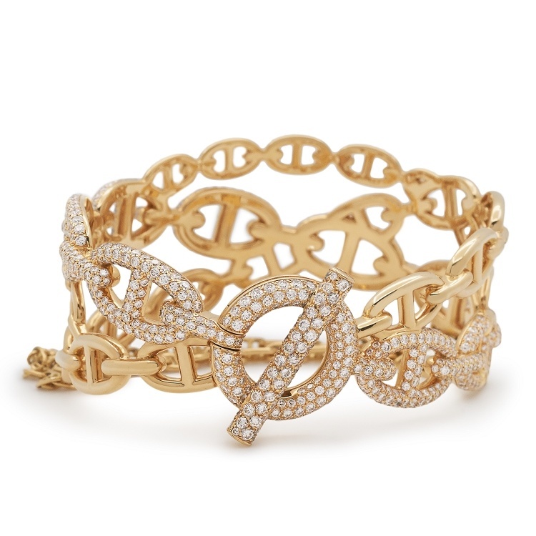 Close-up view of the Hermès Chaîne d'Ancre Enchainée bracelet's intricate links and diamond settings