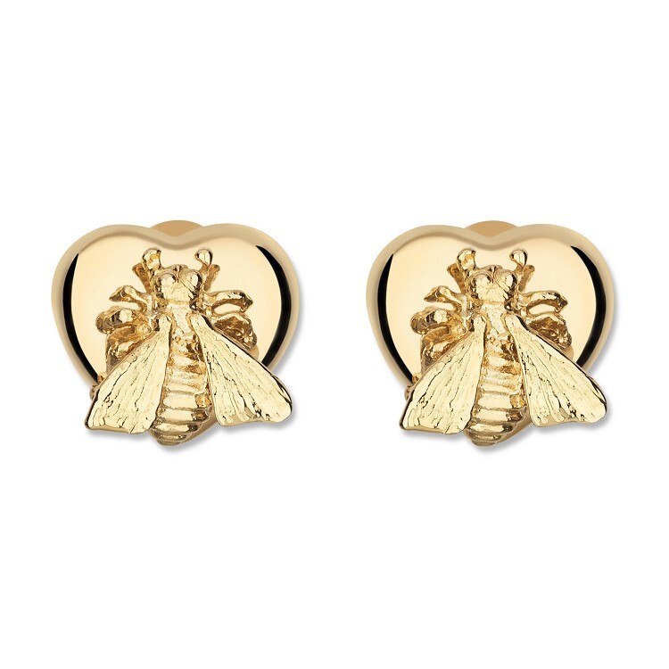 Close-up of Gucci Le Marché des Merveilles gold ring detailing