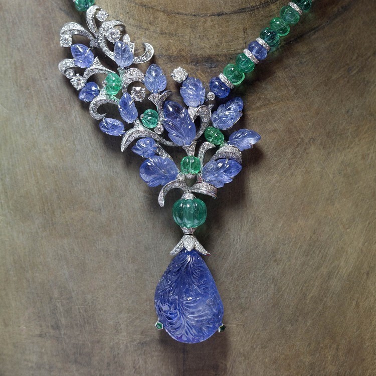 Detailed shot of the emerald and sapphire beadwork on the Cartier 'Fruit Tips' necklace, highlighting the vibrant colors and precision craftsmanship.