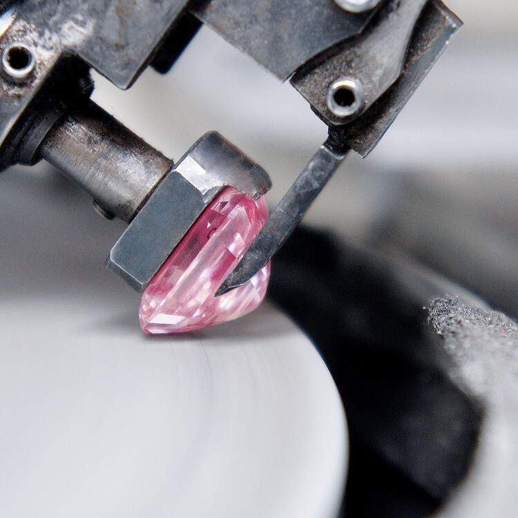 A lifestyle shot of The Graff Pink diamond ring, hinting at its luxurious appeal and significant value.