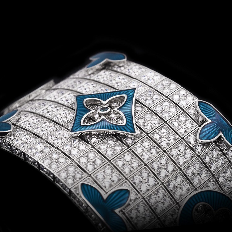 Angled shot of the Louis Vuitton high jewelry bracelet, emphasizing the dazzling brilliant-cut diamonds set into the adjustable Damier squares.