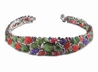 Historic Cartier Tutti Frutti style headband, similar to iconic pieces worn by British socialite Edwina Mountbatten. This image highlights the intricate gemstone carvings.