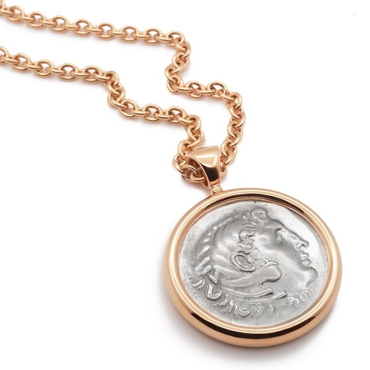 Elegant Bulgari Monete necklace showcasing the rose gold frame and the ancient Greek coin.