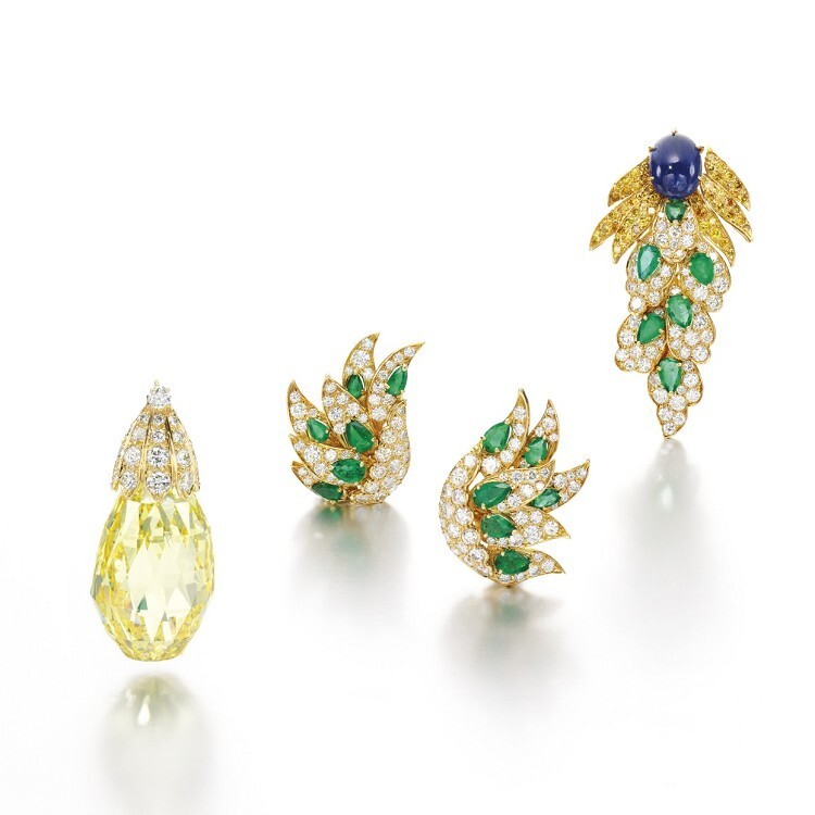 The impressive 96.62ct Fancy Vivid Yellow Walska Briolette diamond suspended from the phoenix brooch