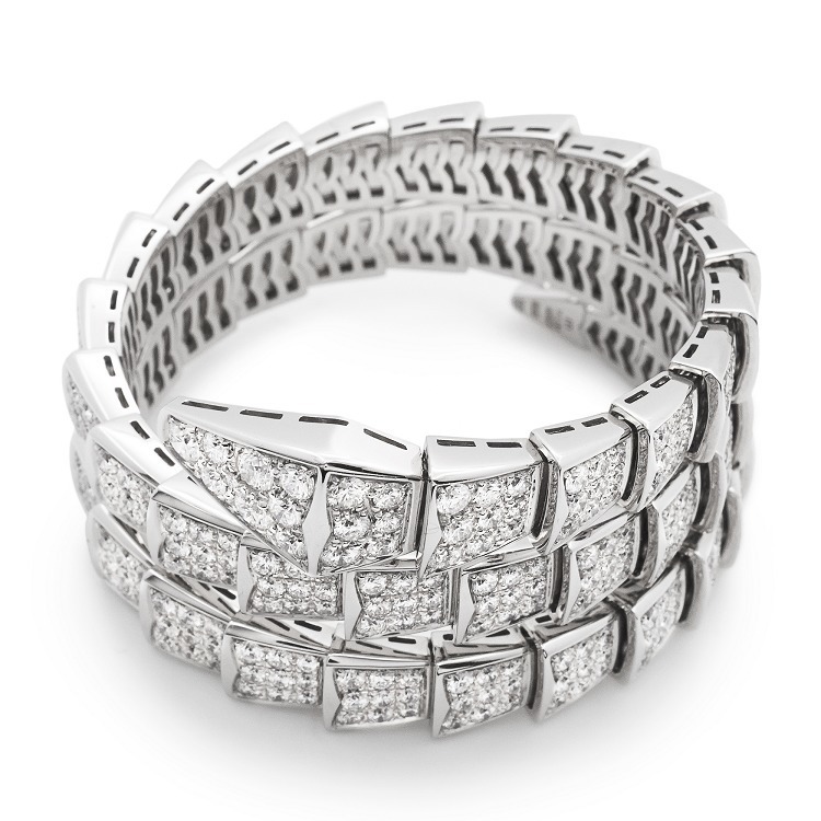Close-up of Bulgari Serpenti Double Circle bracelet, showcasing diamond pavé and intricate chain links