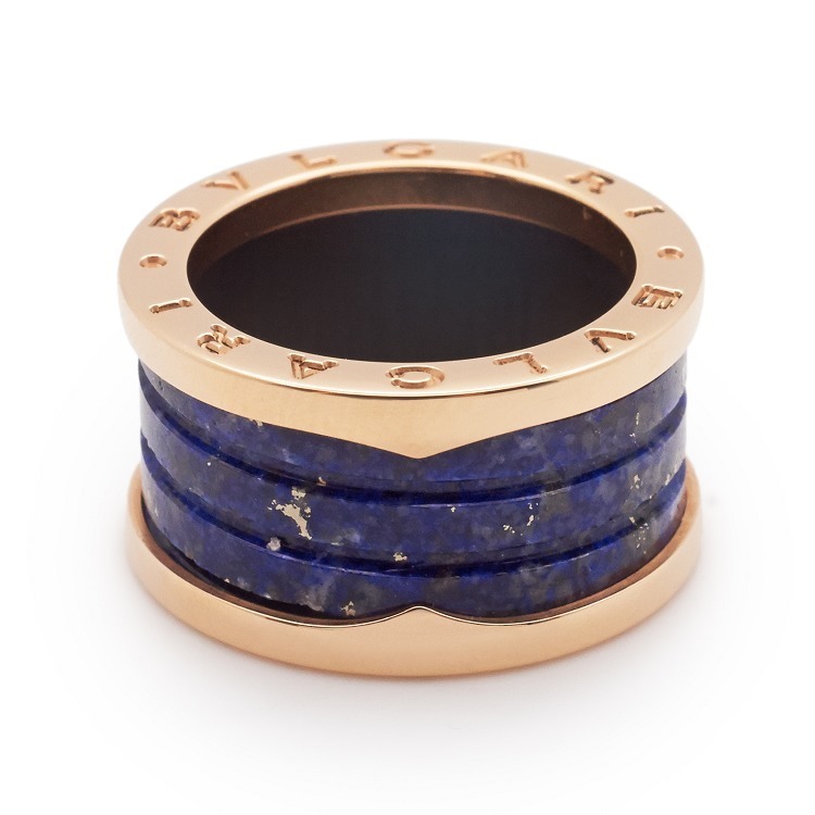 Close-up of a Bulgari B.Zero1 ring, highlighting the 'Tubogas' spiral pattern formed by the exquisite blue marble and rose gold bands.